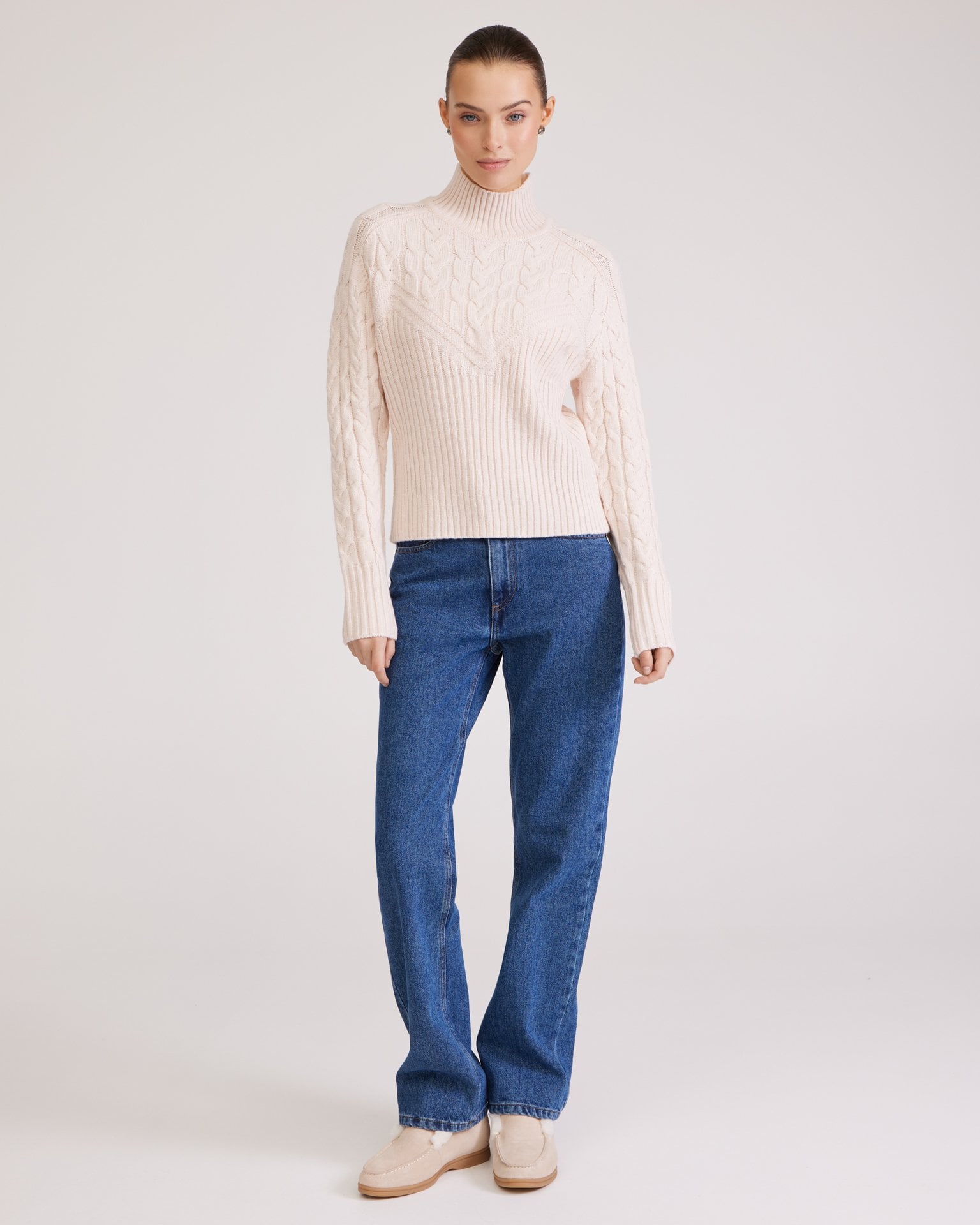 Cream sweater with cable knit