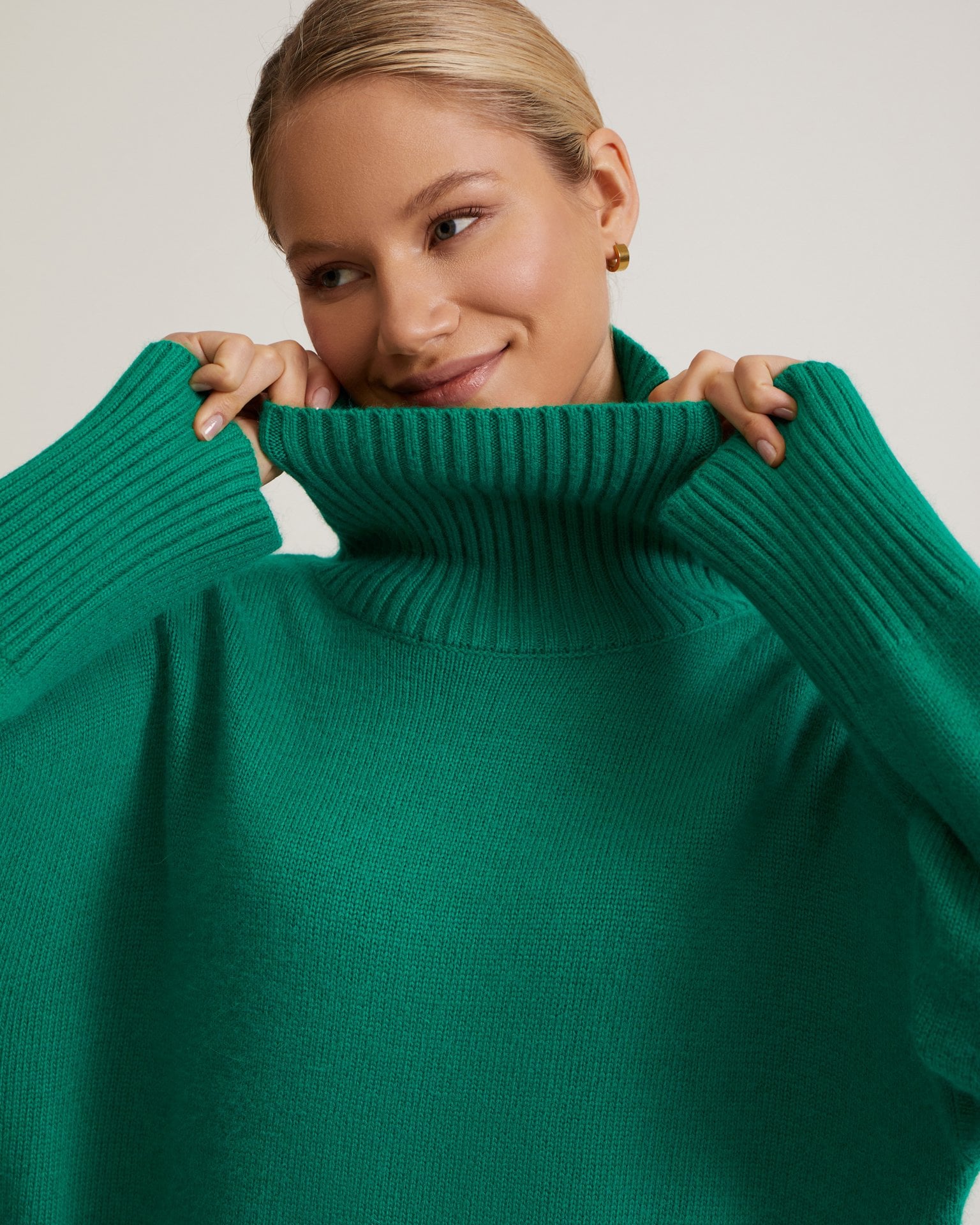 Green high-neck jumper