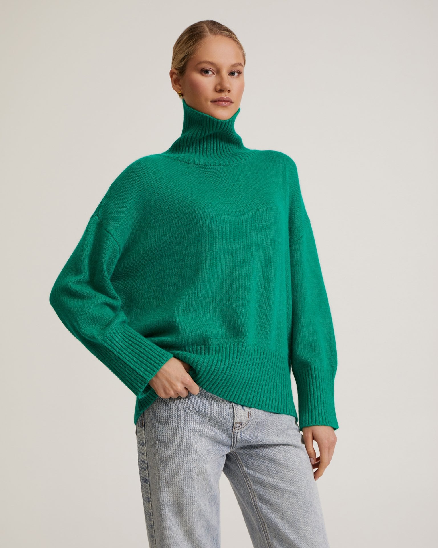 Green high-neck jumper