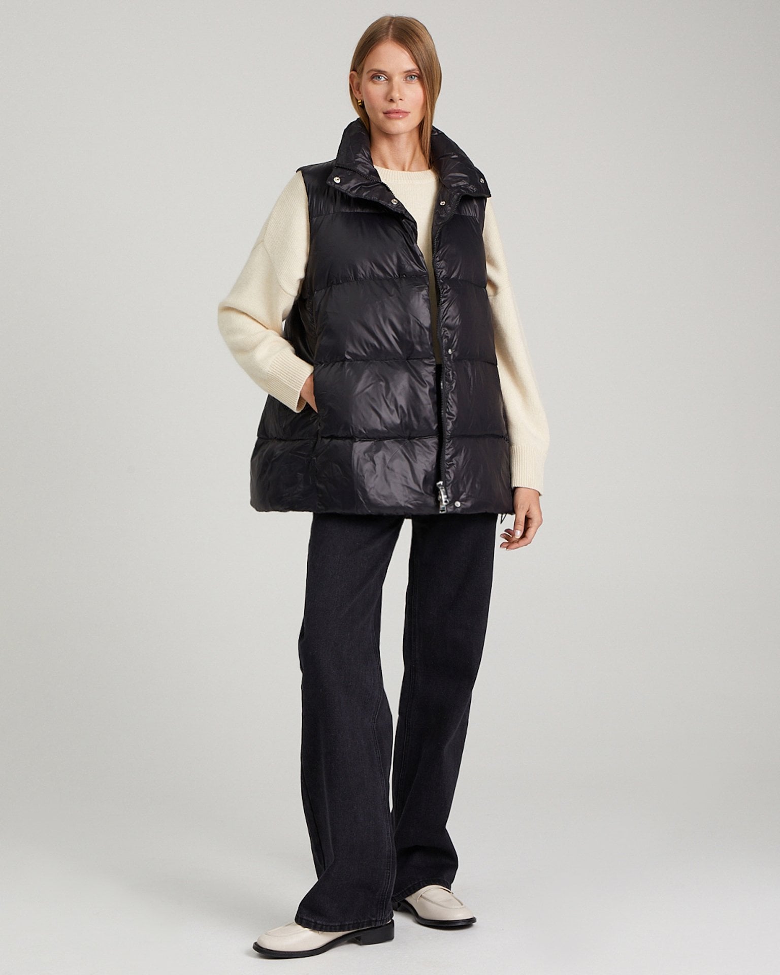 Insulated vest with a stand-up collar