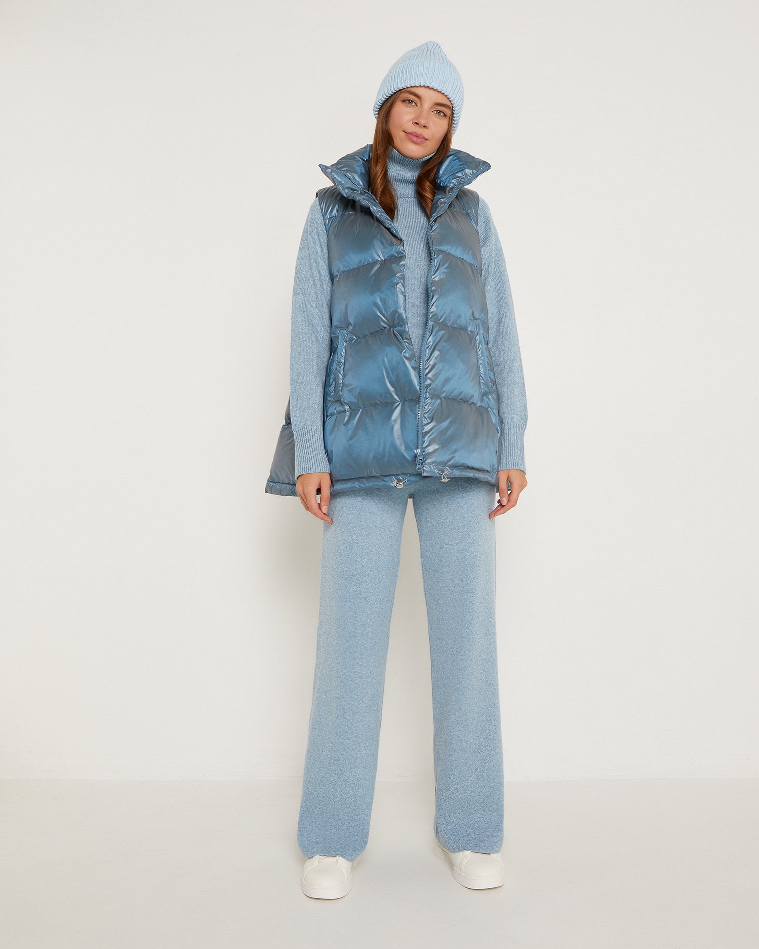 Down and feather filled vest in light blue