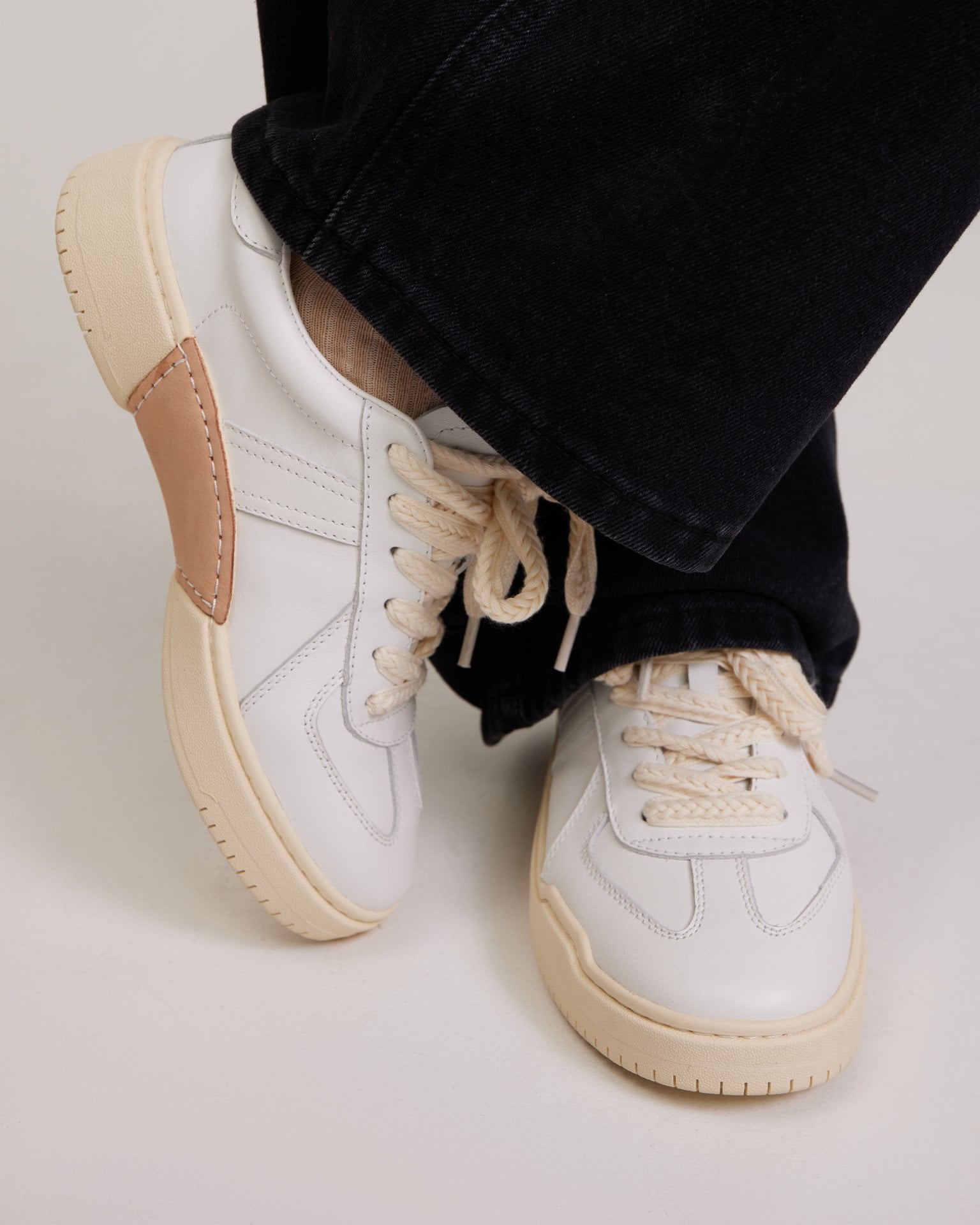 White trainers with inserts