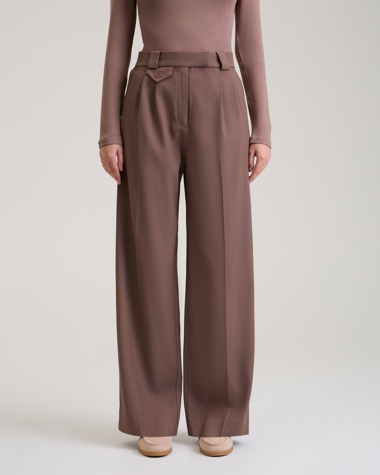 Trousers with decorative pocket in chocolate brown