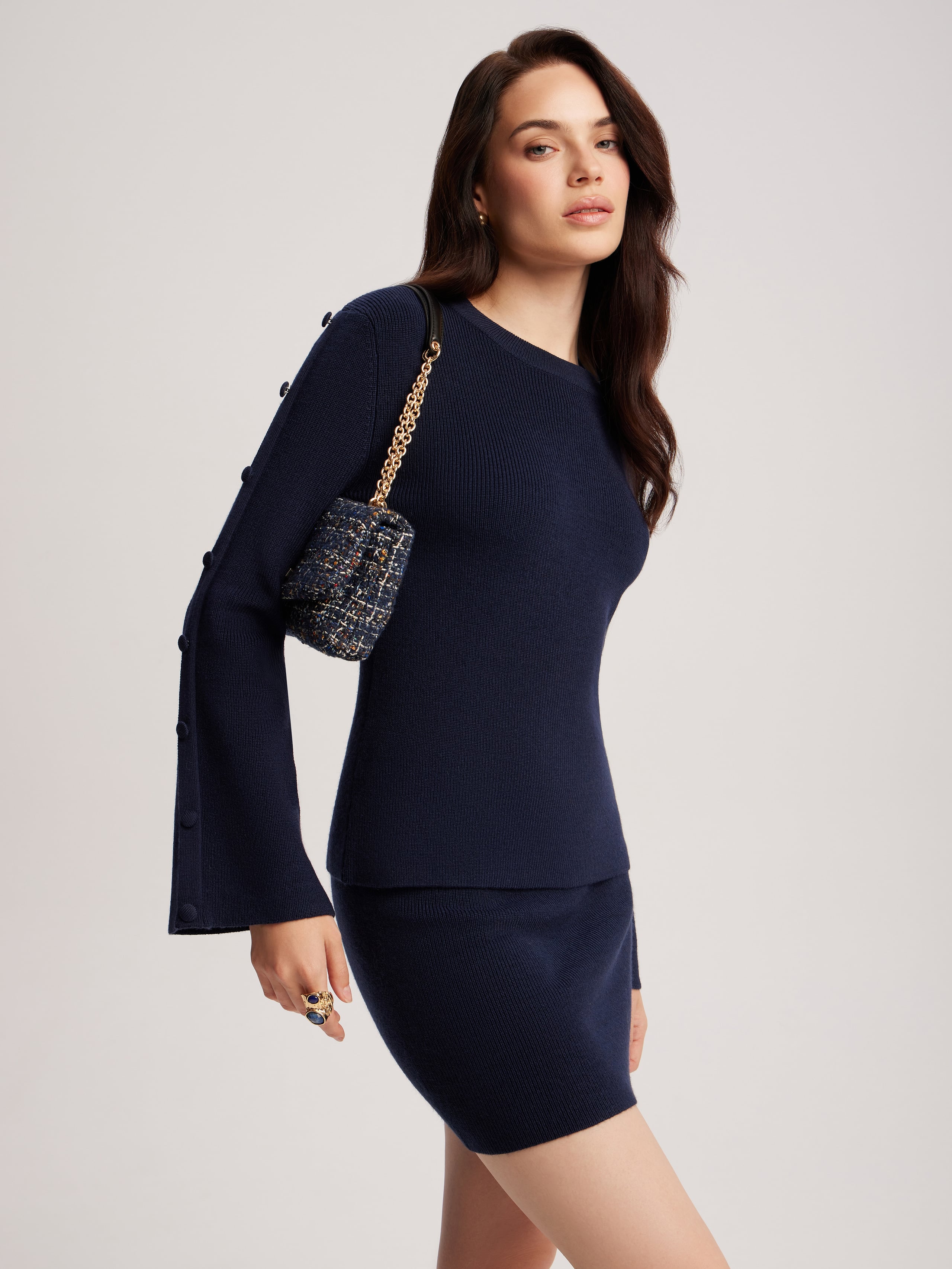 Knitted suit with a skirt