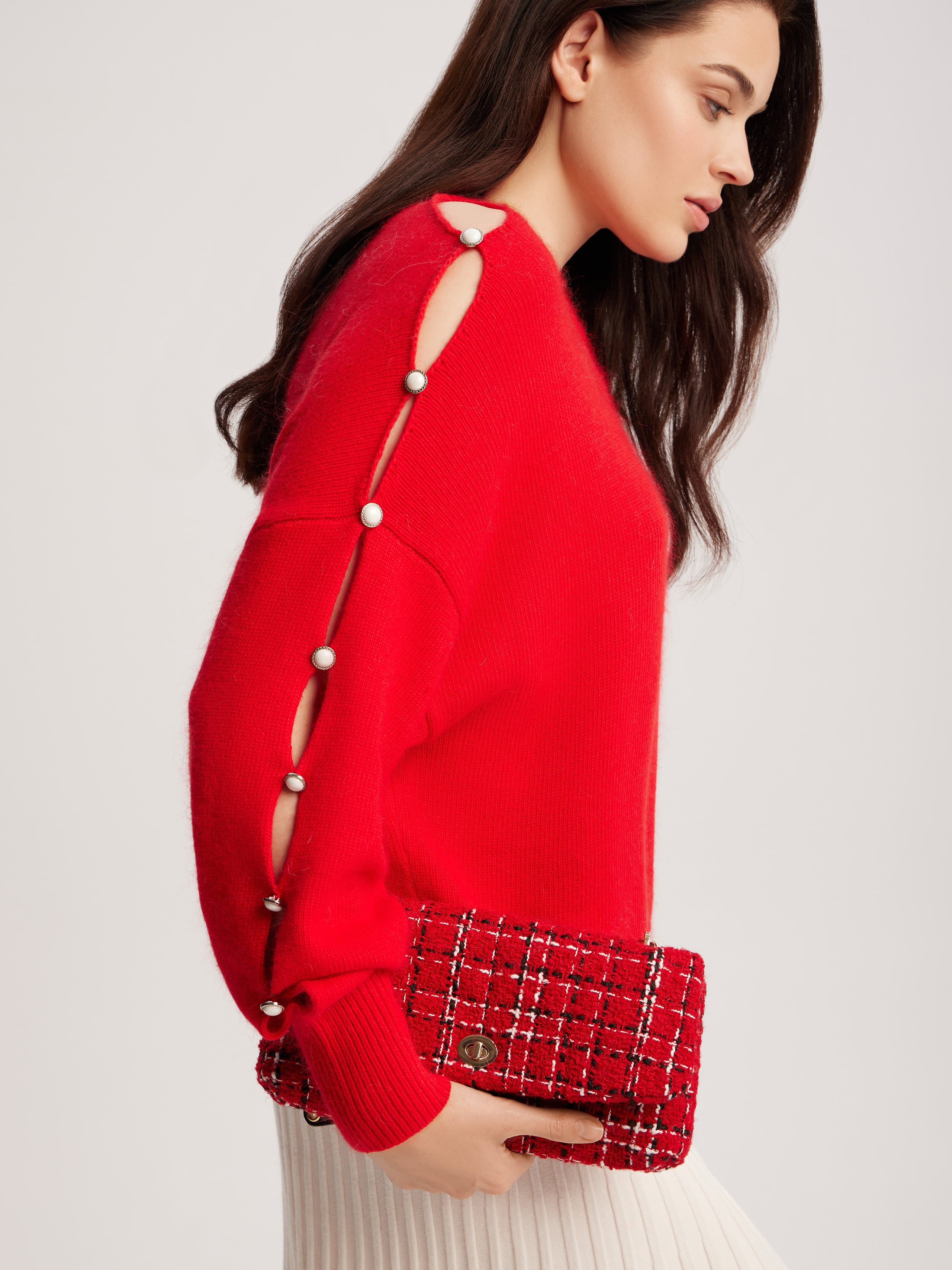 Jumper with accent buttoned sleeves