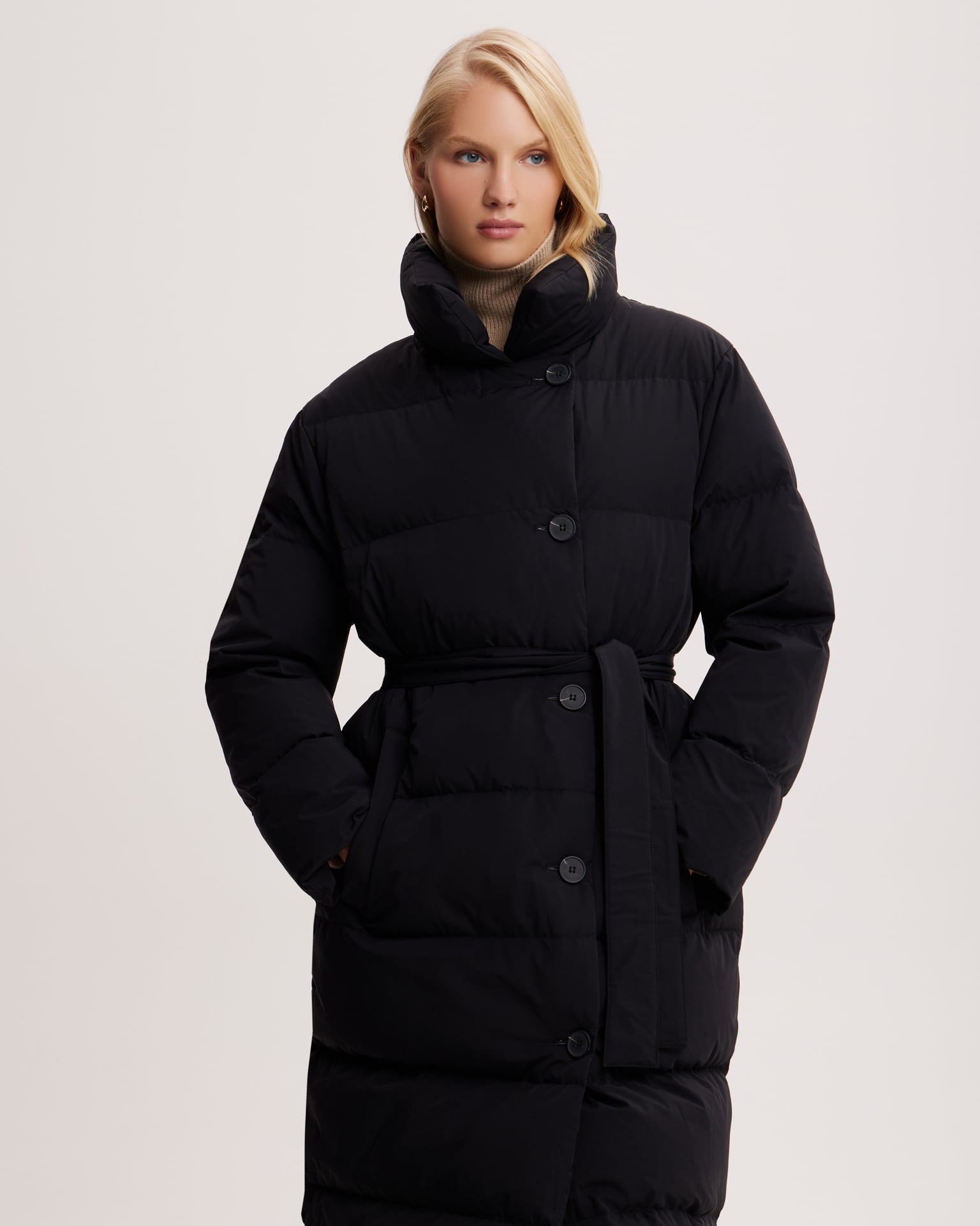 Belted down jacket in black