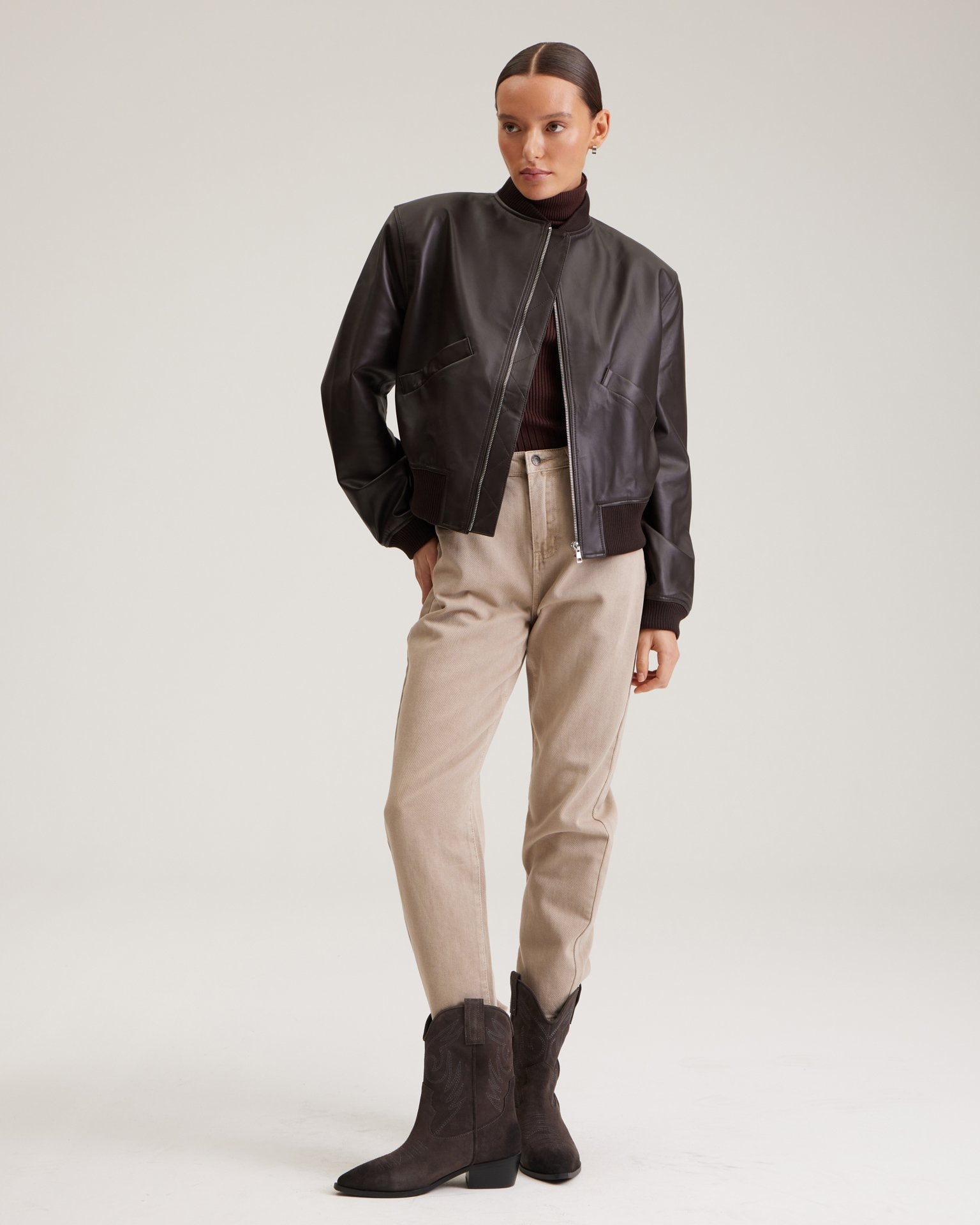 A chocolate leather bomber jacket, Brown