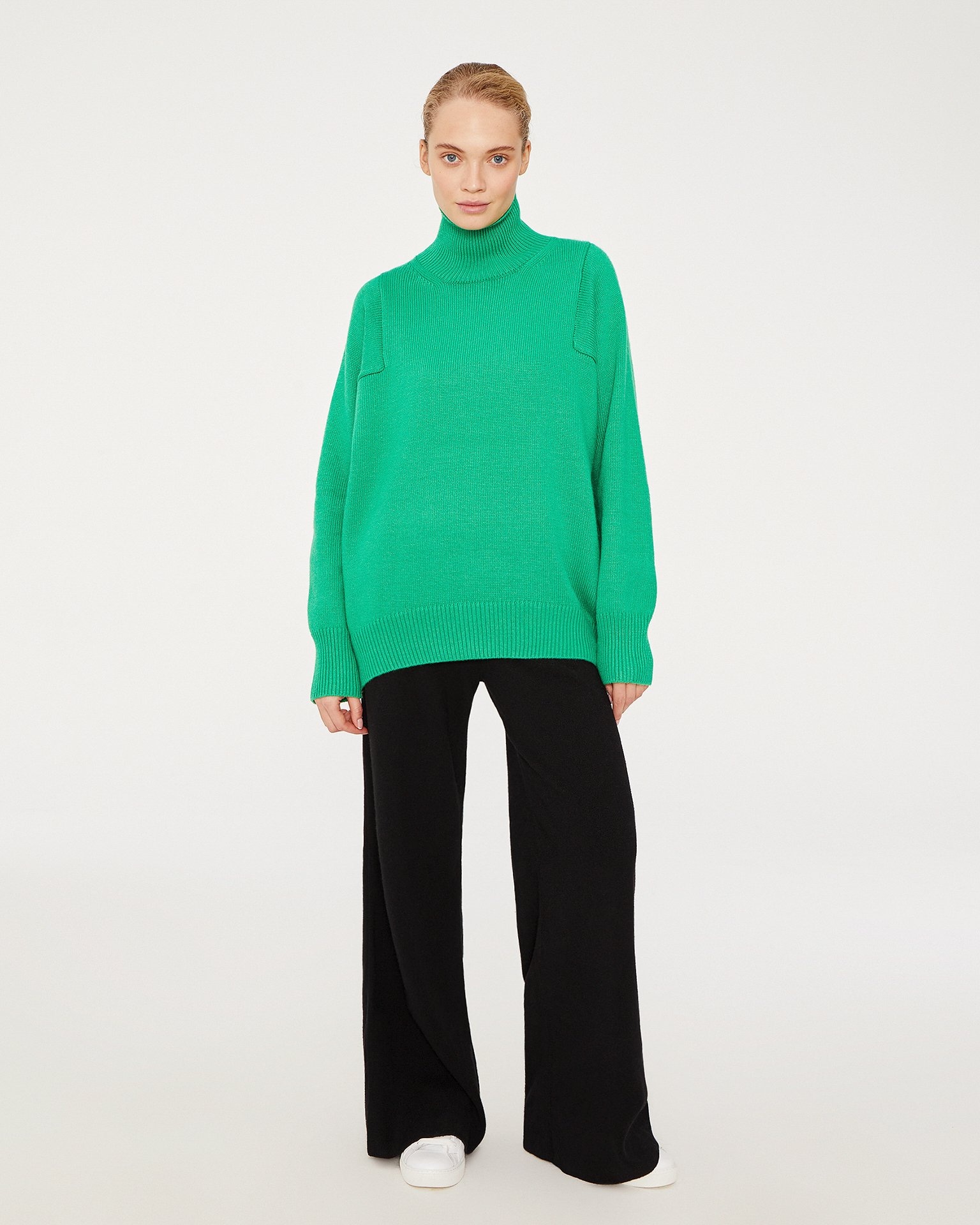 A turtleneck jumper in green