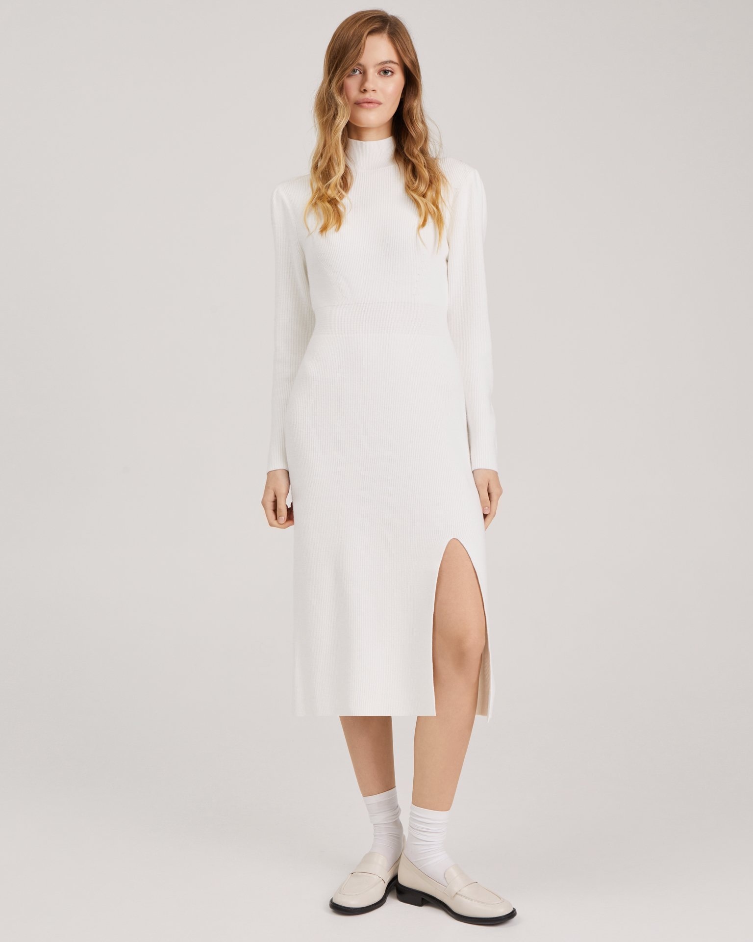 Knitted dress with a slit