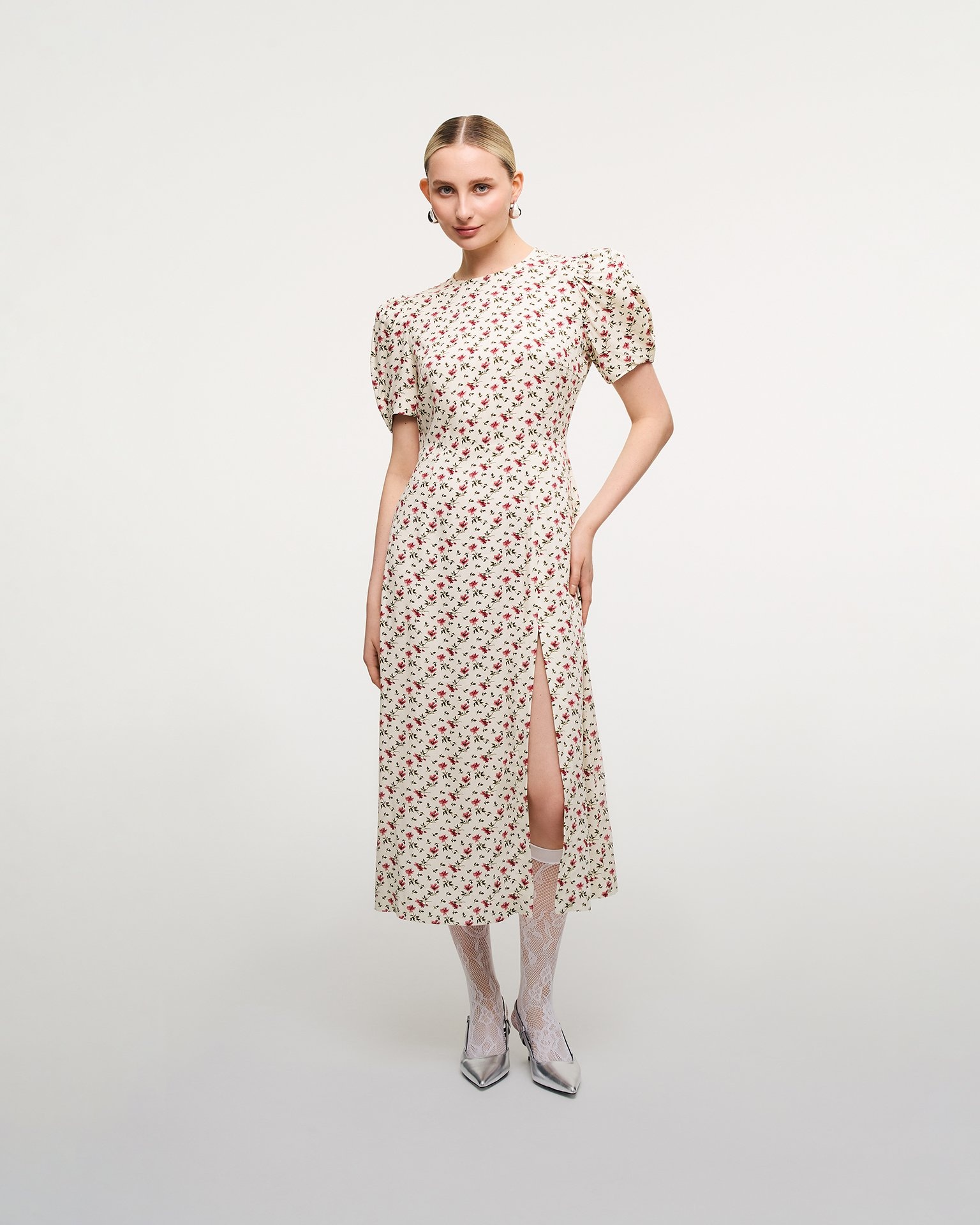 Silver slingback pumps