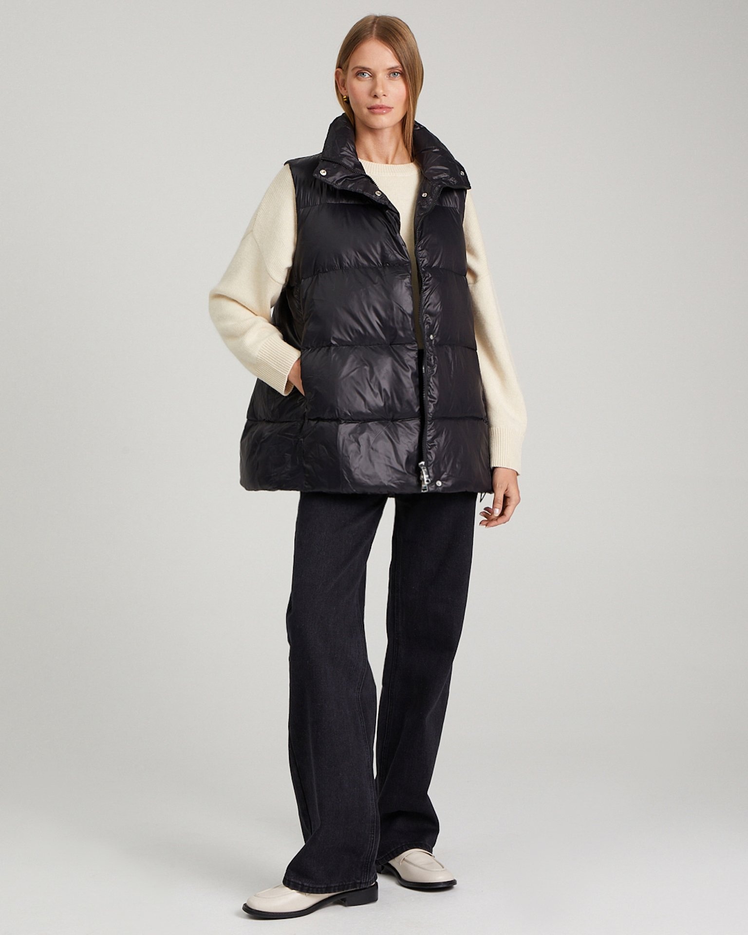 Insulated vest with a stand-up collar