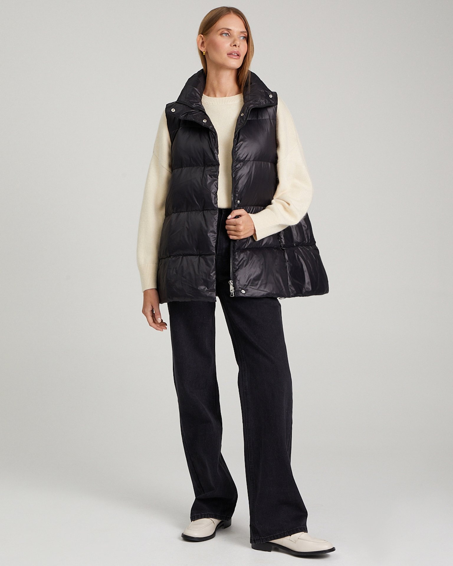 Insulated vest with a stand-up collar