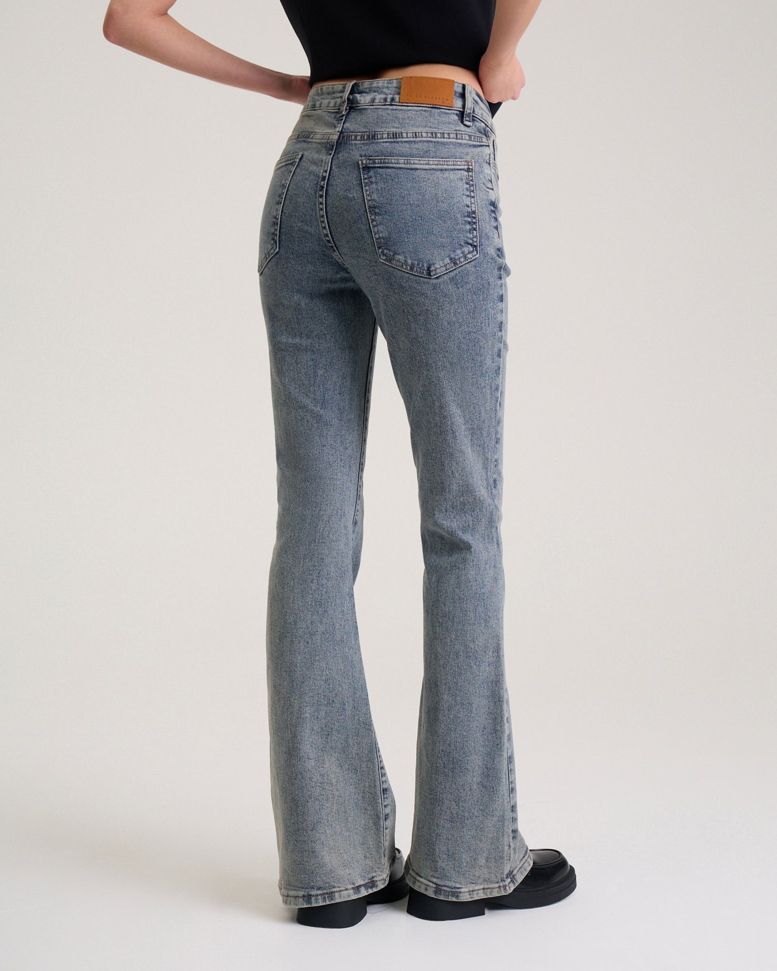 Flared jeans in dusty blue