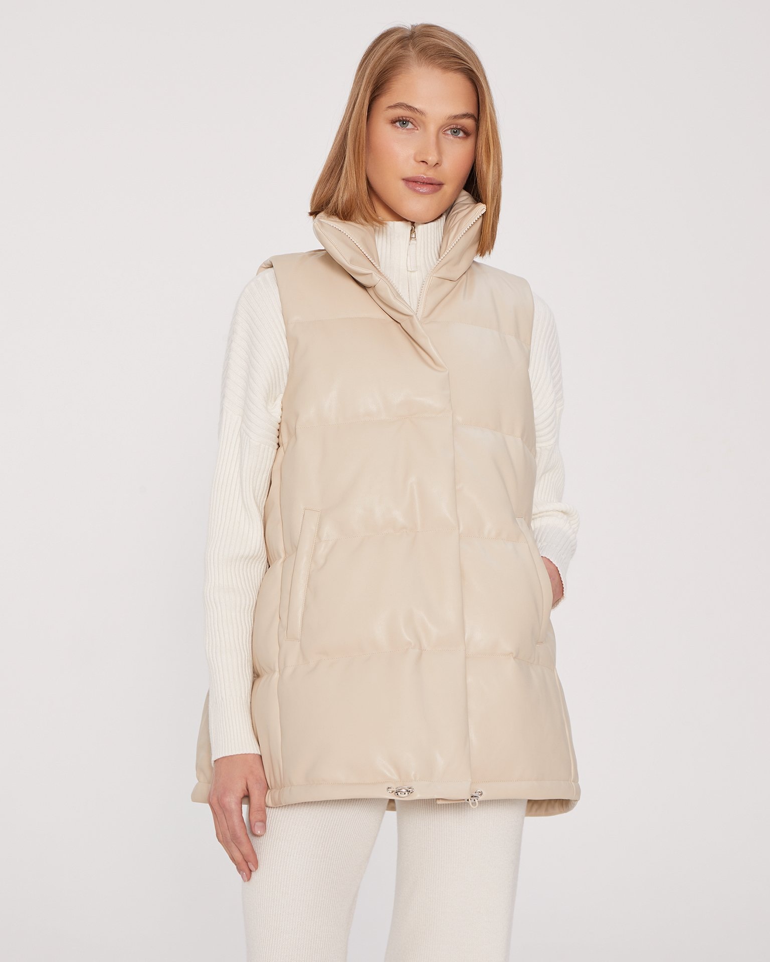 Quilted vest with a stand-up collar in cream