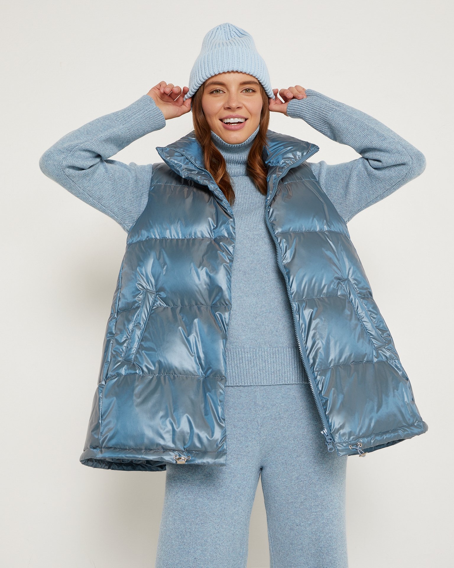 Down and feather filled vest in light blue