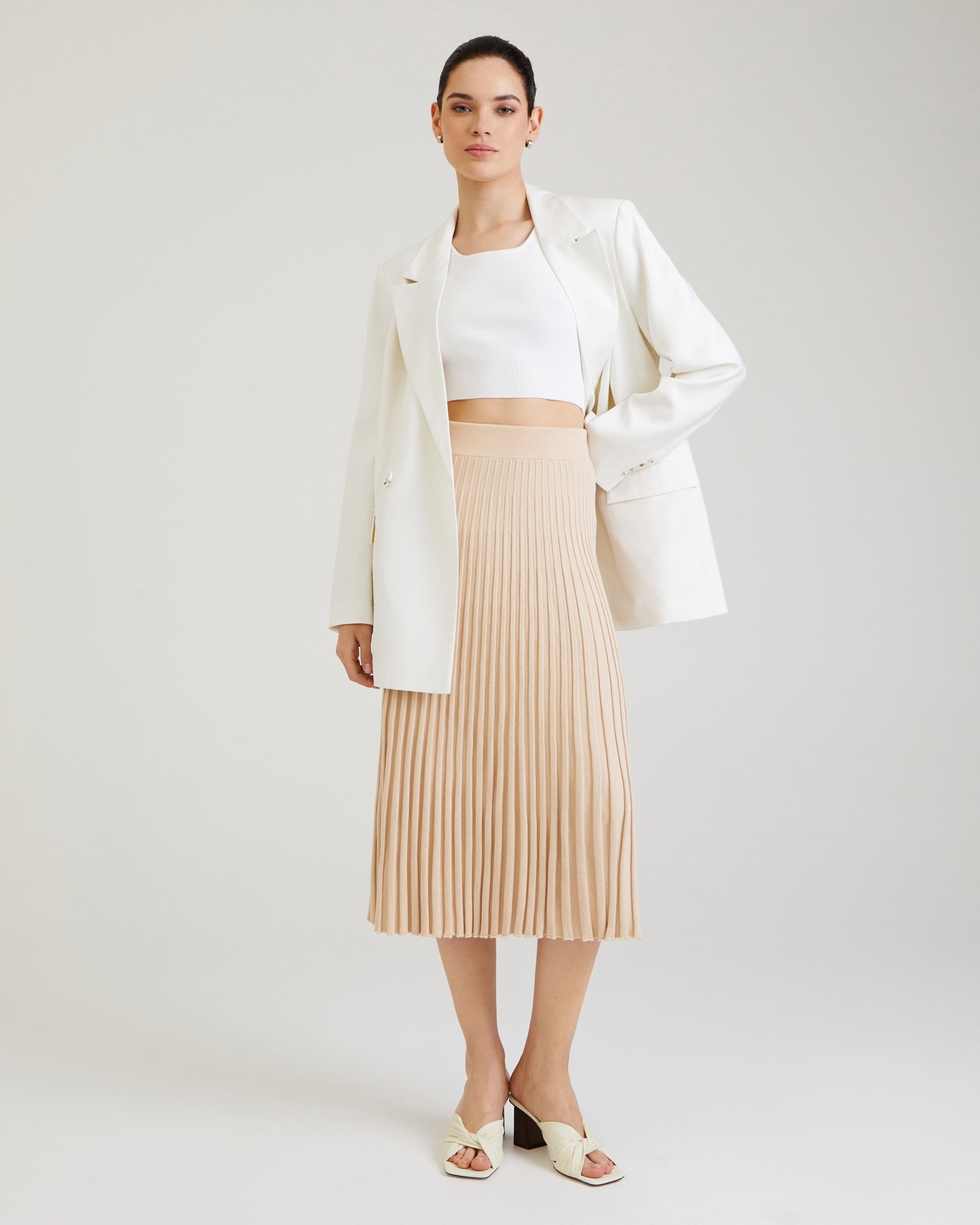 Pleated beige midi skirt