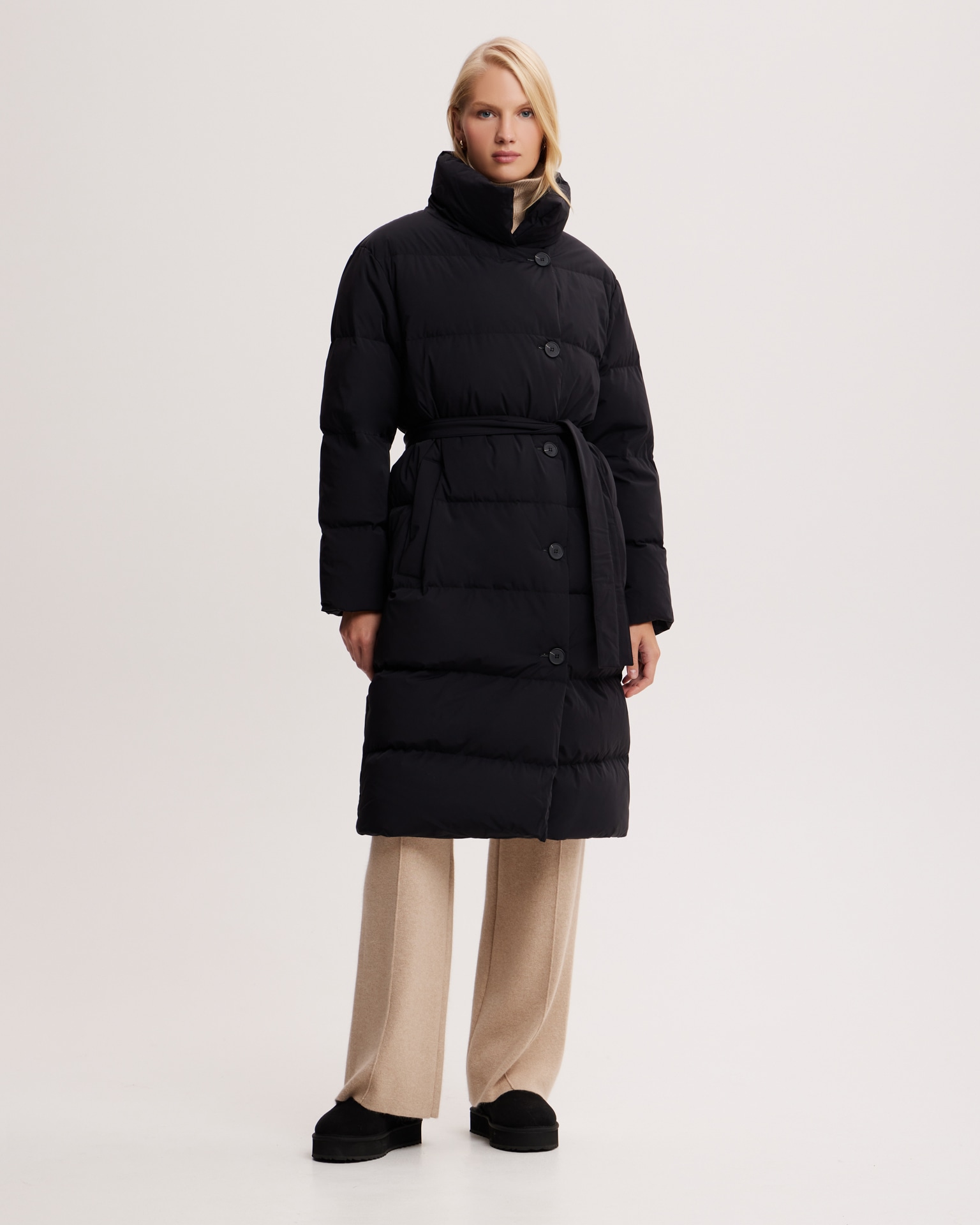 Belted down jacket in black