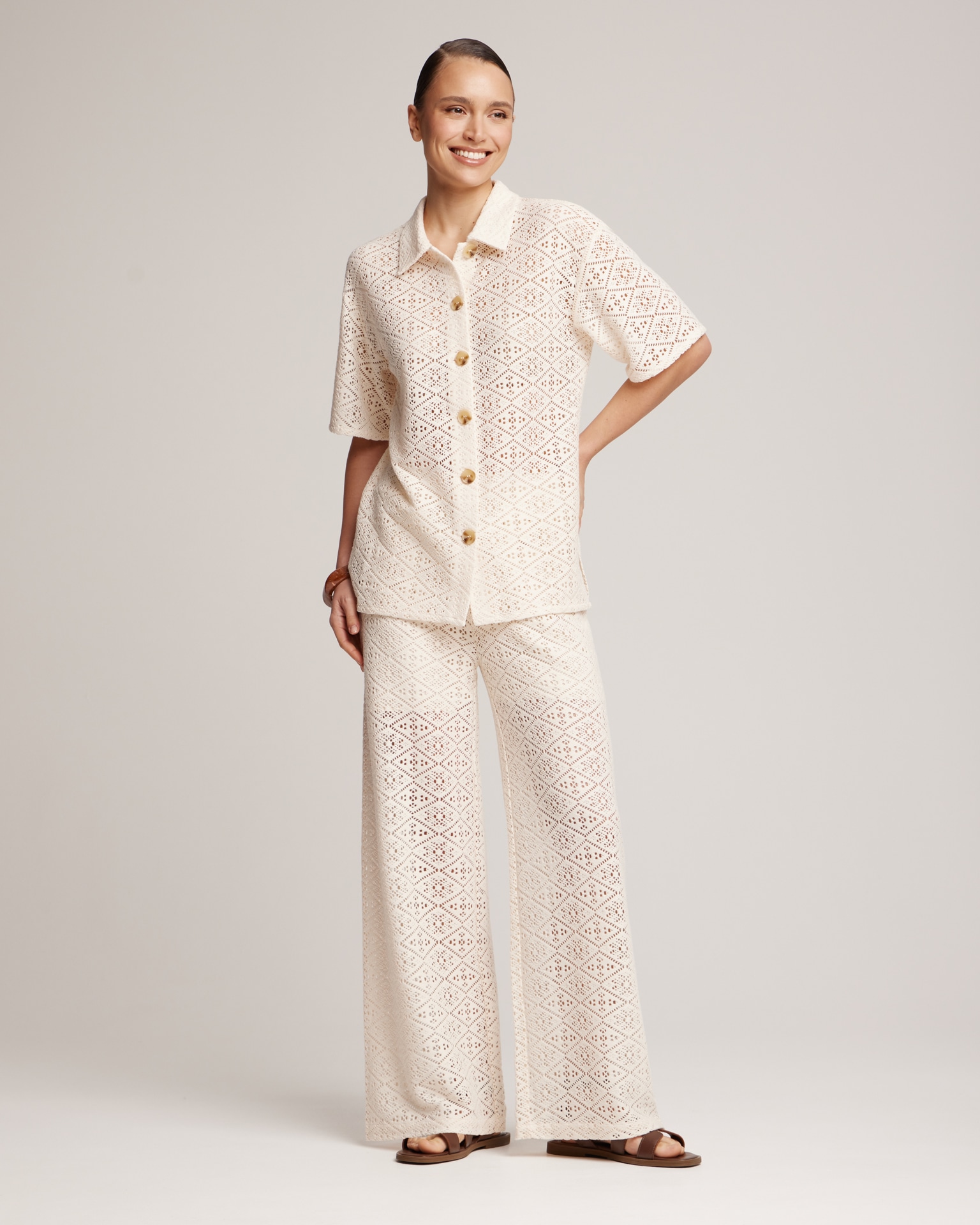 Suit with crochet trousers