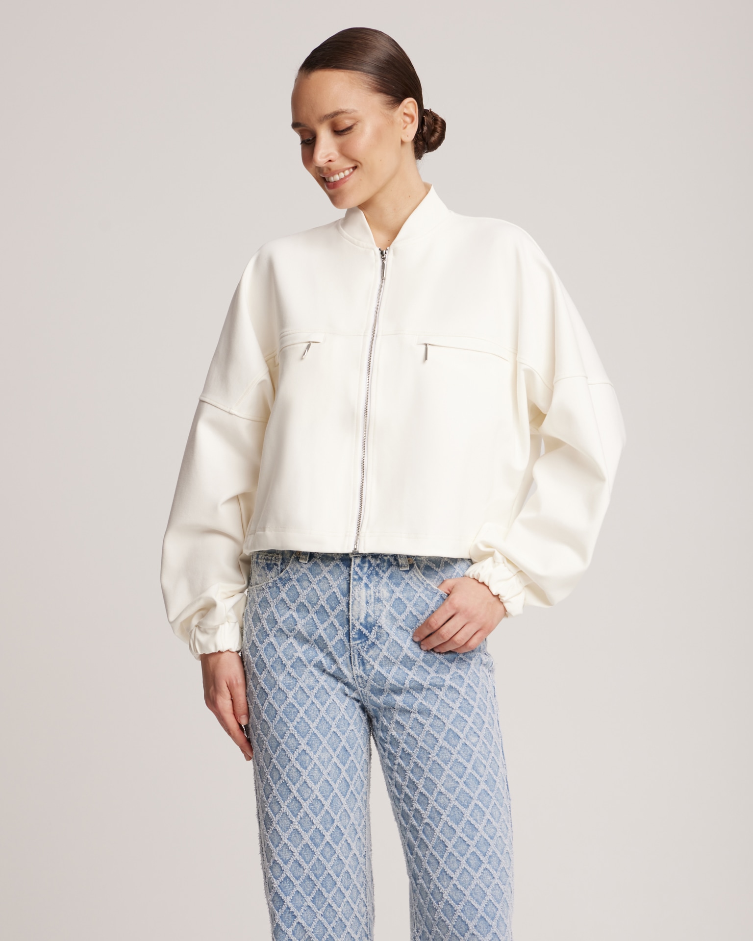 Bomber jacket with adjustable ribbed hem