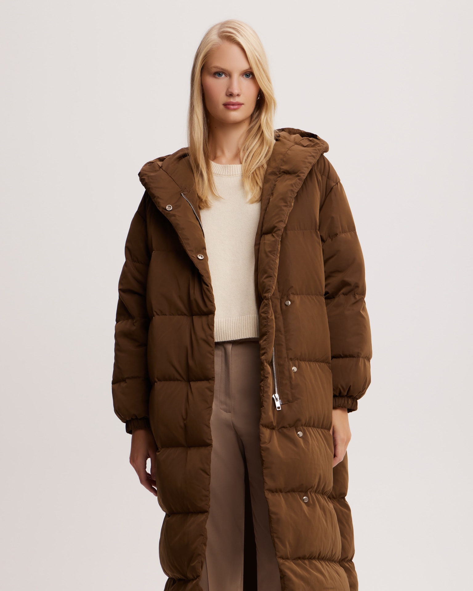 Chocolate brown puffer jacket with snap fasteners