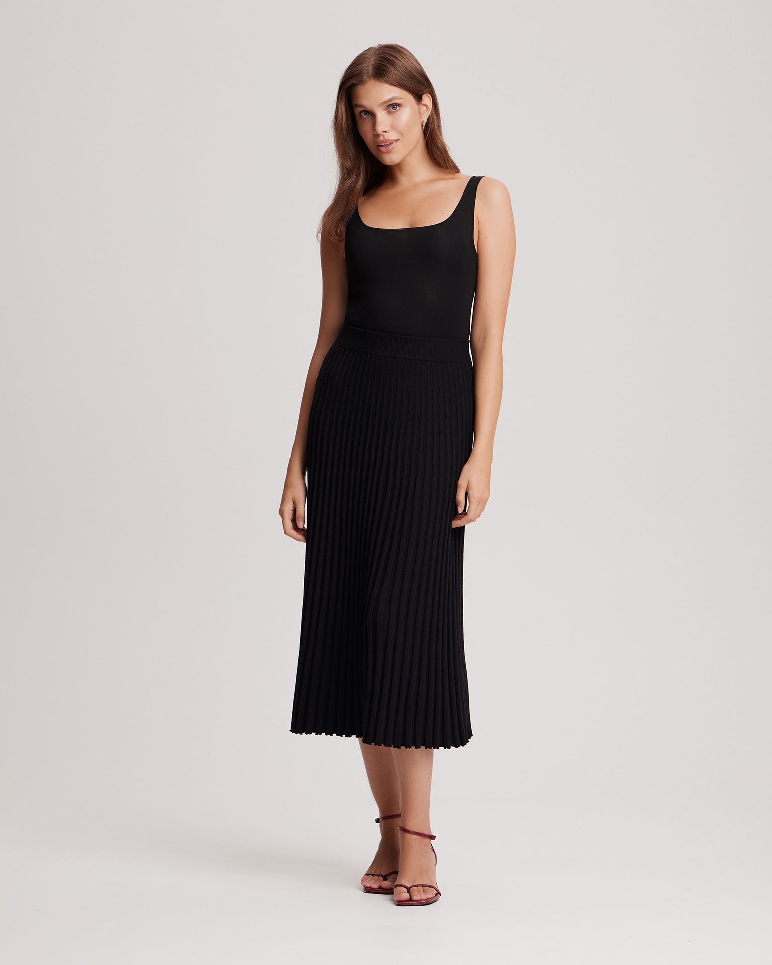 Black pleated midi skirt