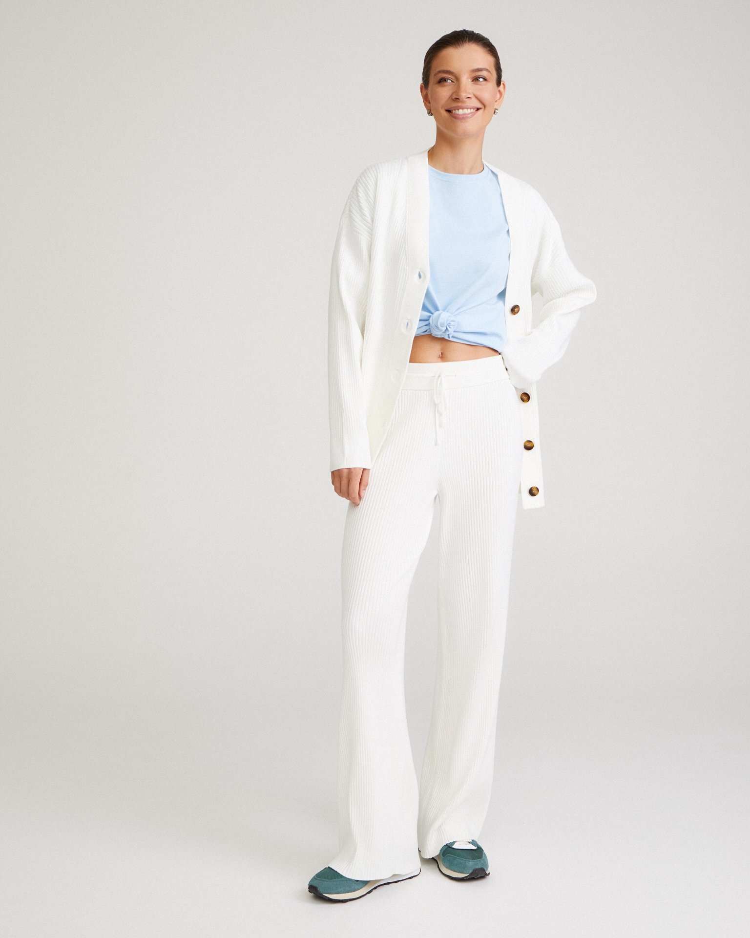 Flared white trousers